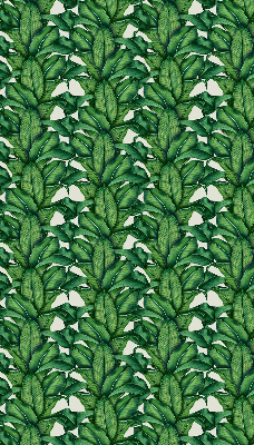 Fabric roller blind with a green leaves pattern