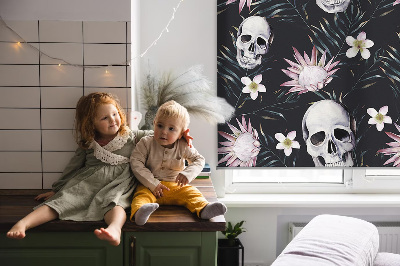 Fabric roller blind with a skulls among flowers pattern