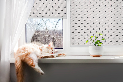Fabric roller blind with a triangles pattern
