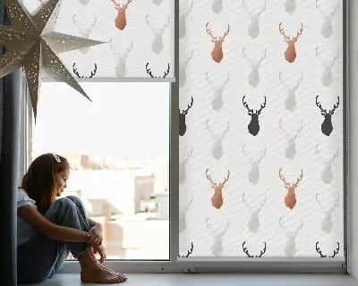 Fabric roller blind with drawn deer heads pattern