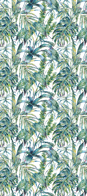 Fabric roller blind with a tropical leaves pattern