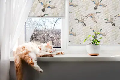 Fabric roller blind with a flying ducks pattern