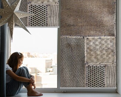 Modern roller blind with a metal wall mount