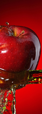 Fabric roller blind An apple doused with water