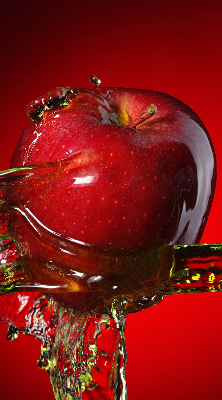 Fabric roller blind An apple doused with water