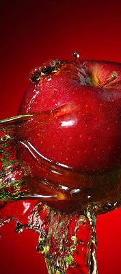 Fabric roller blind An apple doused with water
