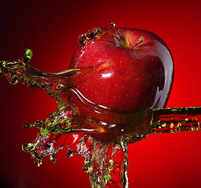 Fabric roller blind An apple doused with water