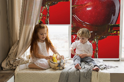 Fabric roller blind An apple doused with water