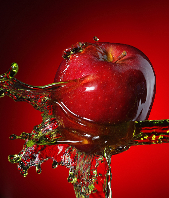 Fabric roller blind An apple doused with water