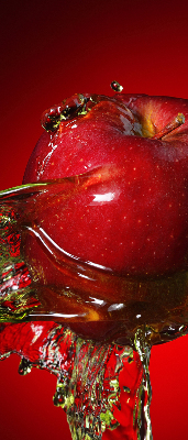 Fabric roller blind An apple doused with water