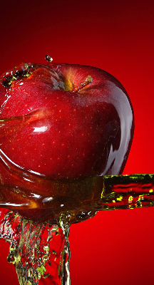Fabric roller blind An apple doused with water