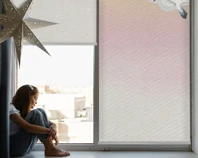 Fabric roller blind with a flying birds pattern