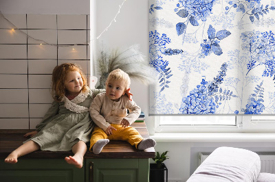 Blackout window roller blind with blue flowers pattern
