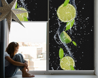 Blackout roller blind lime falling in water print