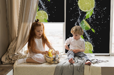 Blackout roller blind Lime falling in water