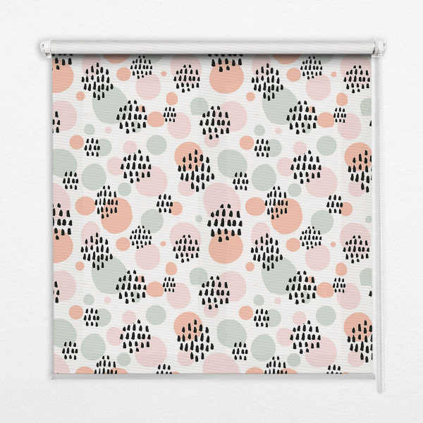 Blackout roller blind with black dotted patches