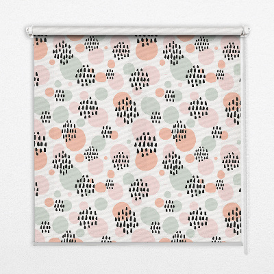 Blackout roller blind with black dotted patches