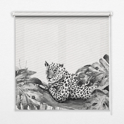 Blackout roller blind for window with a pattern of cheetahs on a branch