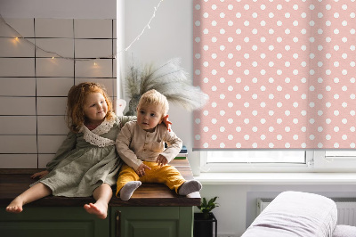 Fabric roller blind for window with white dots pattern