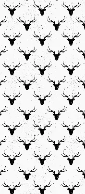 Blackout roller blind with black deer head pattern
