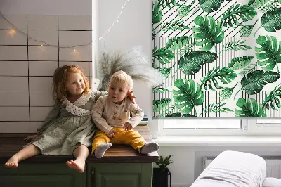 Fabric roller blind for window with tropical leaves print