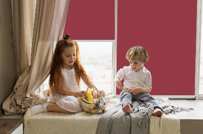 Fabric roller blind for window in claret