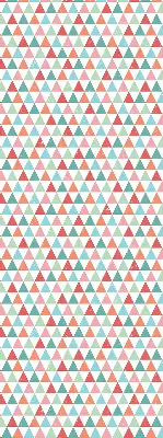 Blackout roller blind with a colorful triangle pattern