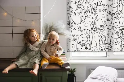 Blackout roller blind with a drawn cats pattern