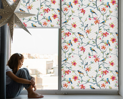 Fabric roller blind for window with bird on a branch design