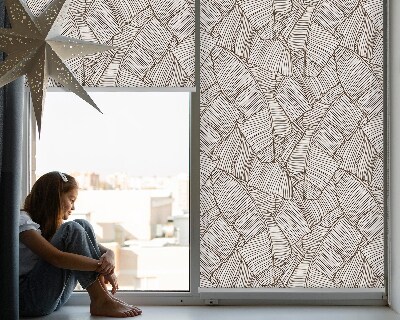 Blackout roller blind for window with a drawn palm leaves pattern