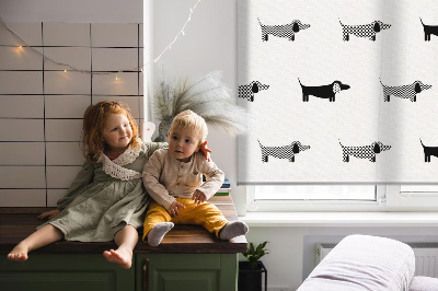 Fabric roller blind for window with drawn dogs print