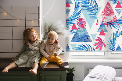 Fabric roller blind for window with blue leaves and triangles pattern