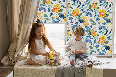Fabric roller blind for window Yellow houses blue plants