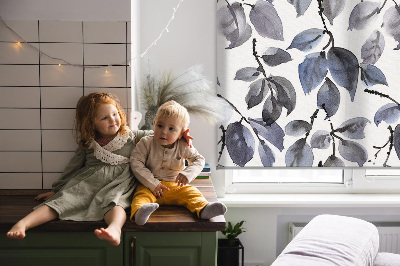 Blackout roller blind with a dark leaves pattern