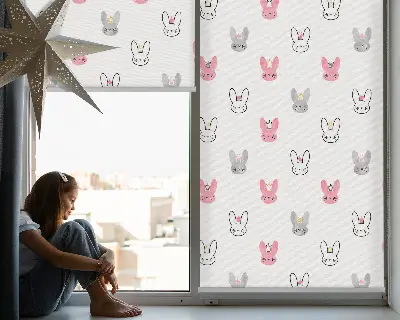 Blackout roller blind for window with colorful rabbits in crowns design