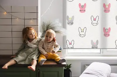 Blackout roller blind for window with colorful rabbits in crowns design