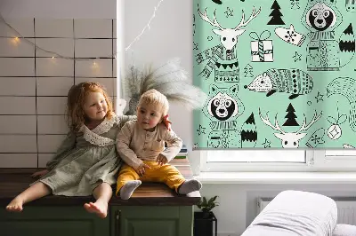Fabric roller blind for window with winter animals print