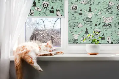 Fabric roller blind for window with winter animals print
