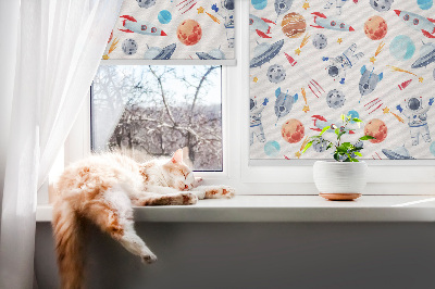 Blackout roller blind for window with rockets, cosmonauts, planets, and UFOs