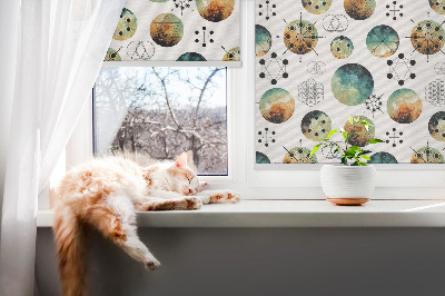 Blackout roller blind with colored circles pattern