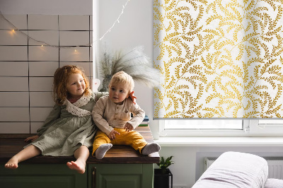 Blackout roller blind with a golden branches pattern