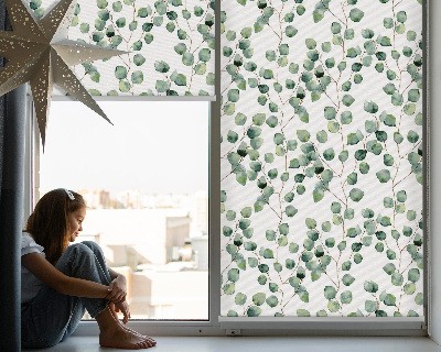 Blackout roller blind with a leaves from the branches pattern