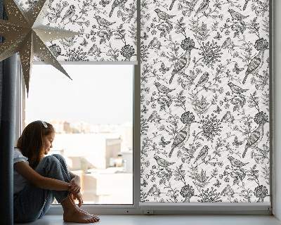Blackout roller blind with drawn birds and plants design