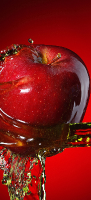 Blackout roller blind with an apple doused in water design