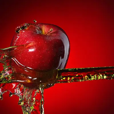 Blackout roller blind with an apple doused in water design