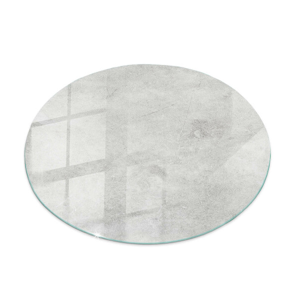 Round glass top for coffee table Scratches on the concrete surface
