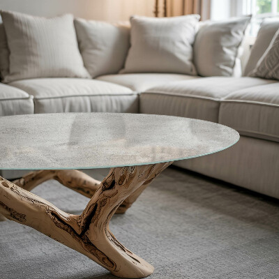 Round glass top for coffee table Scratches on the concrete surface