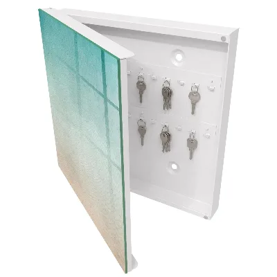Wall-mounted key box with a subtle gradient finish