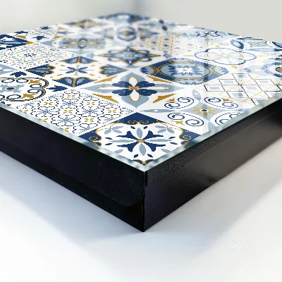 Wall-mounted key box with colorful tile design
