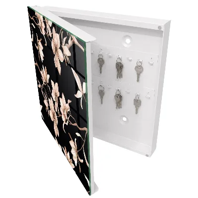 Wall mounted key box with cream flower design